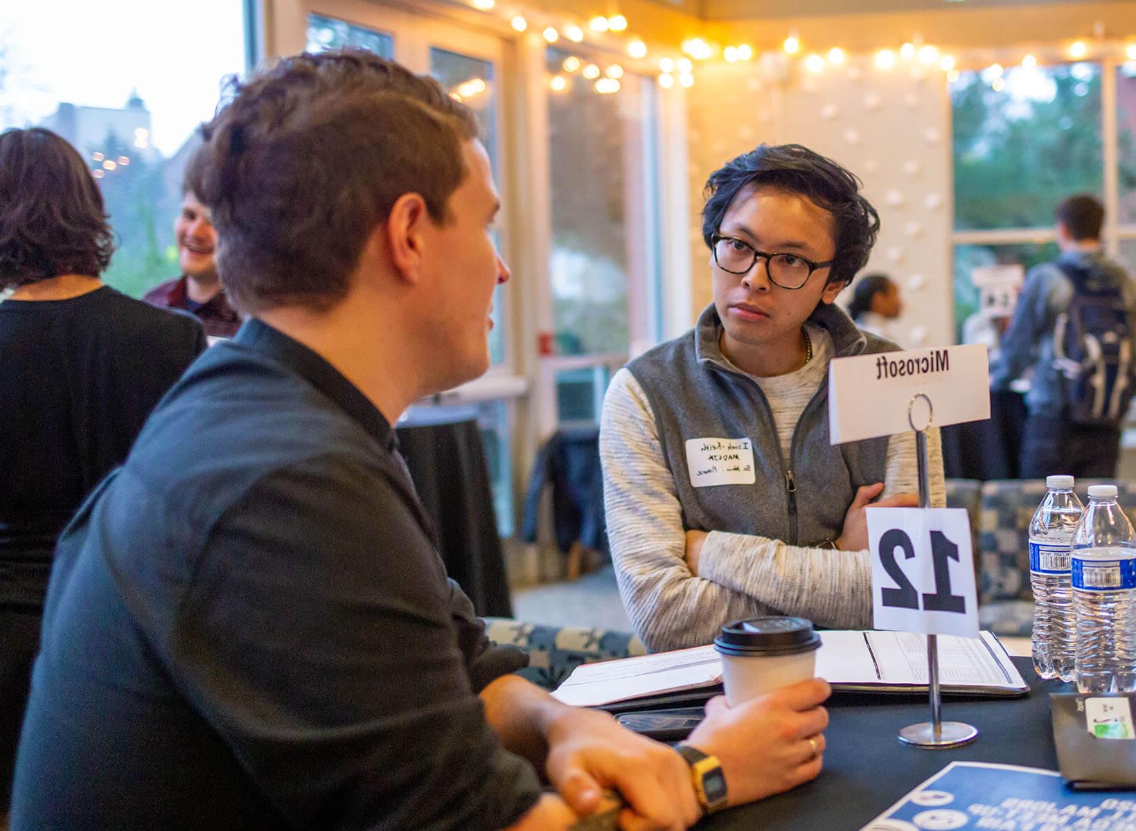 An SPU student attends a networking event on campus